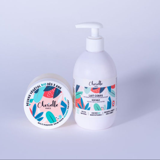 Pot de Beurre bio  et Flacon de lait corps sur fond blanc .